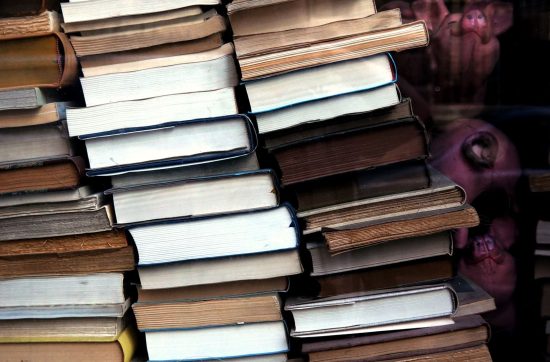 Book in pile learn french