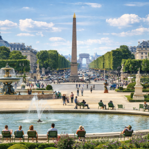 View of Place de la Concorde and the Tuileries Garden in Paris on a sunny day, illustrating the joy and confidence of speaking French while traveling.